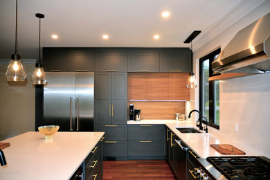This is an example of a transitional kitchen in Ottawa.