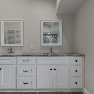 Master bath with cement tile feature wall
