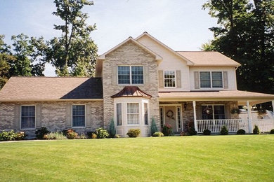 Inspiration for a large two-story exterior home remodel in Other