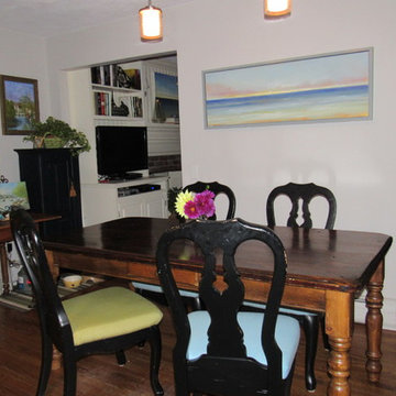 Informal eating area with original artwork by RI artist Mike Bryce