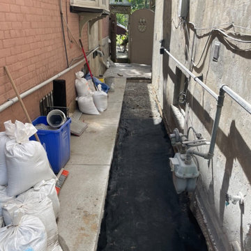 New hardscape stone paver pathway with drain installation
