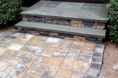 Design ideas for a front yard brick landscaping in Other.