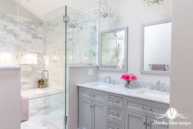 Inspiration for a mid-sized transitional master gray tile and marble tile porcelain tile and beige floor double shower remodel in Chicago with flat-panel cabinets, gray cabinets, an undermount tub, a two-piece toilet, gray walls, an undermount sink, marble countertops, a hinged shower door and white countertops