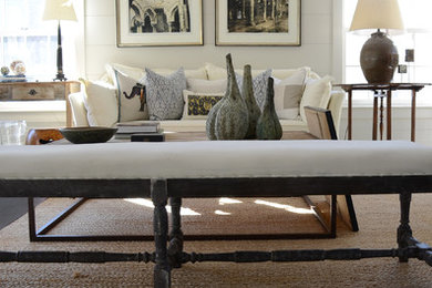 Mid-sized farmhouse formal and enclosed dark wood floor and brown floor living room photo in New York with white walls and no tv