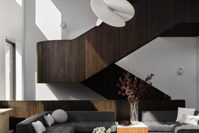 Inspiration for a contemporary open concept living room remodel in Chicago with white walls