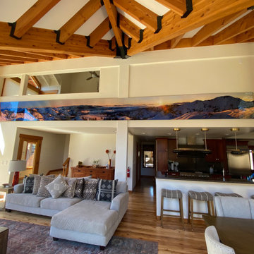 Living room, kitchen and dining room panoramic view