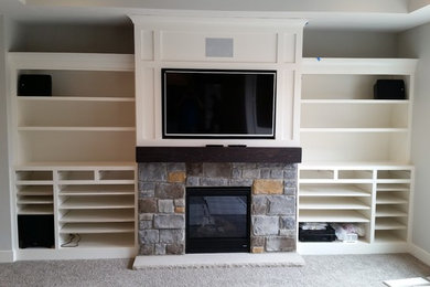 Arts and crafts family room photo in Grand Rapids