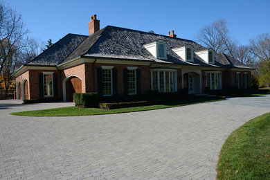 Example of a trendy brown exterior home design in Detroit