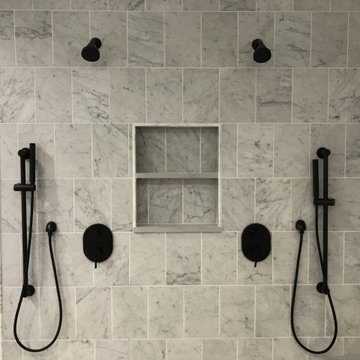 Marble wall tile with double plumbing fixtures