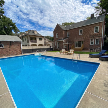 Brick Rear Facade with In-Ground Pool