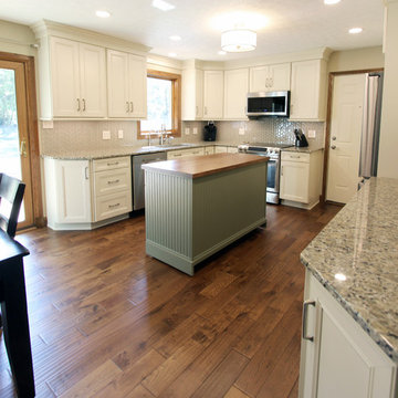 Cream Kitchen with Green Island with Butcher Block Countertop