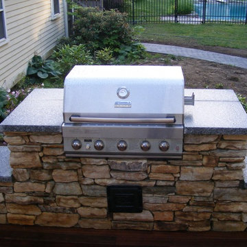 Deck and stone wall.