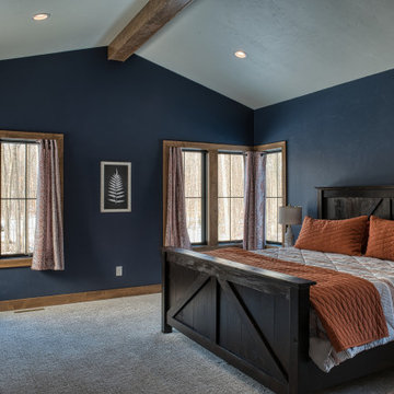 Primary Bedroom with Wooded Views