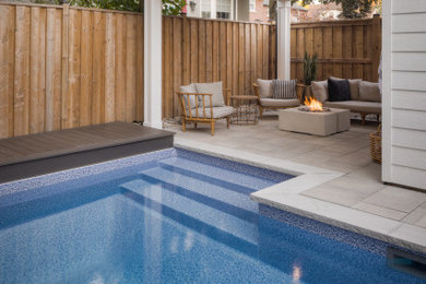 Example of an arts and crafts pool design in Toronto