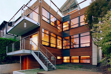 Design ideas for a modern exterior in Seattle with wood siding.