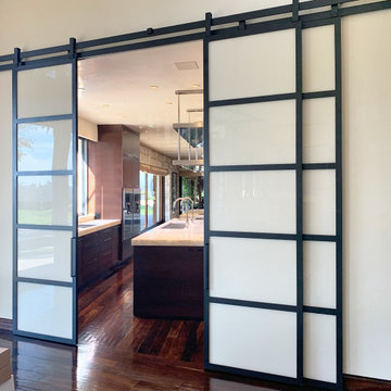 Glass and Metal Barn Doors with Custom Painted Glass