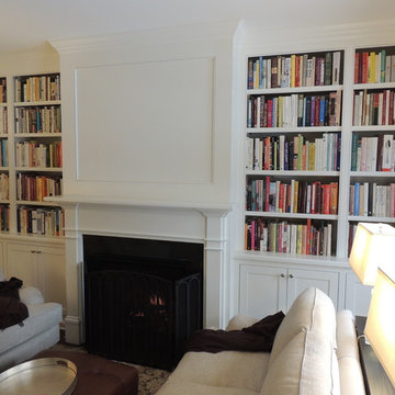 Custom Mantel surrounded with built-in cabinetry