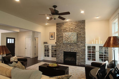 Example of an arts and crafts living room design in Cedar Rapids