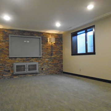 Entertainment / Workout Area.  Paint color is Pashmena Gray from Benjamin Moore