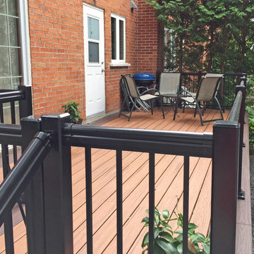 Tiki Torch Decking With Lava Rock Picture Frame and Cedar Wood Skirting