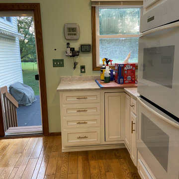 Traditional Kitchen Remodel Done in a Snow White with Walnut Glaze