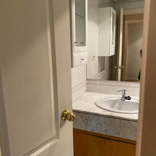 Antes y después: De espacio agobiante a baño moderno y cálido