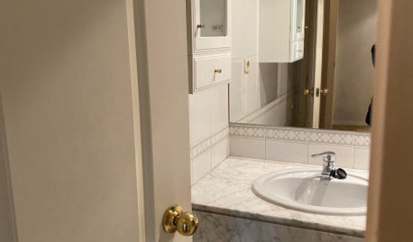 Antes y después: De espacio agobiante a baño moderno y cálido