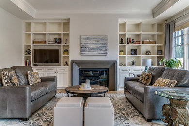 Transitional living room photo in Calgary