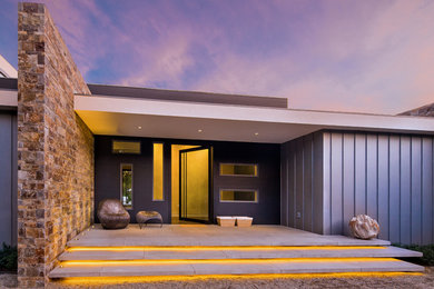 Example of a minimalist exterior home design in New York