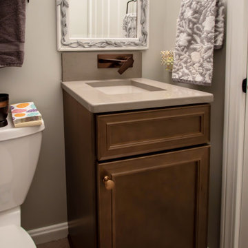 Maple Stained Shaker Wet Bar with Matching Tile in Powder Room