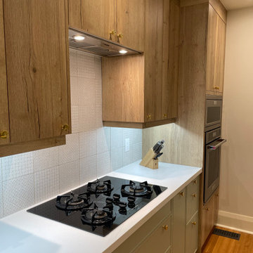 IKEA Kitchen with Custom White Oak and Sage Green Doors by Allstyle
