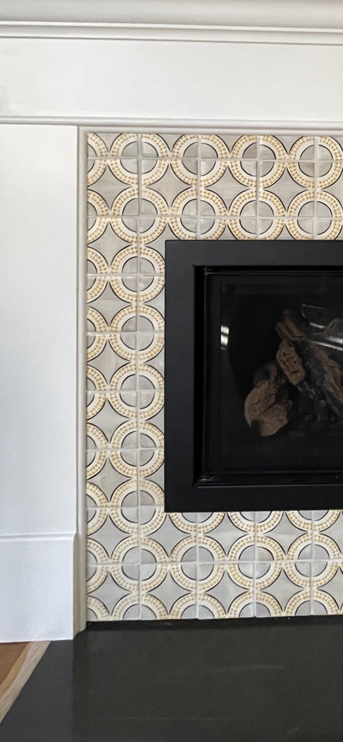 Caulk or grout fireplace seam, and what color?