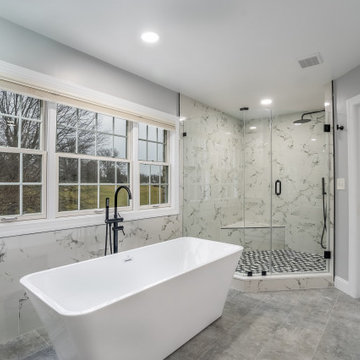 Master Bathroom Remodeled With White Flooring, Bathtub, Shower, Highland MD