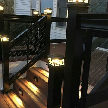 Decks with glass handrails and cable rails