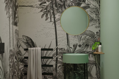 カターニア／パルレモにあるコンテンポラリースタイルのおしゃれな浴室 (一体型トイレ	、緑の壁、ペデスタルシンク) の写真