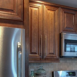 Chocolate color wall cabinets - Kitchen Cabinetry