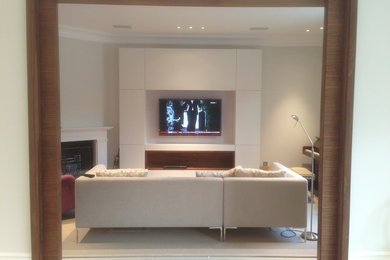 This is an example of a contemporary living room in Hampshire.