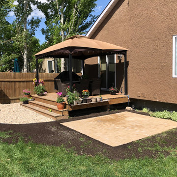 Backyard Hot Tub Pad & Decorative Rock Installation - Barkman Holland Pavers