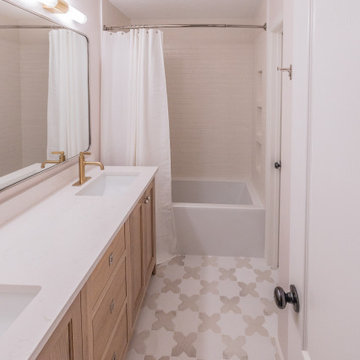 Playful Guest Bath Remodel with Fun Tile and Mixed Metals