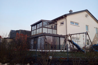 This is an example of a contemporary conservatory in Munich.