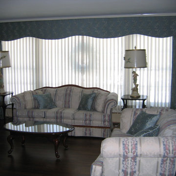 Shaped Cornice over Drapery Panels over Sheer Vertical Wrap. Custom Pillows.