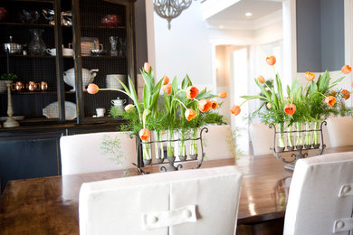 Enclosed dining room - large transitional medium tone wood floor and brown floor enclosed dining room idea in Other with gray walls and no fireplace