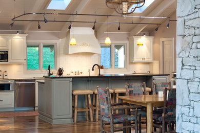 Inspiration for a rustic kitchen remodel in Kansas City with raised-panel cabinets, white cabinets, white backsplash and subway tile backsplash