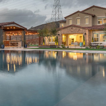 Gorgeous Infinity Pool with mulitple outdoor living spaces