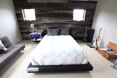 Example of a minimalist bedroom design in Denver