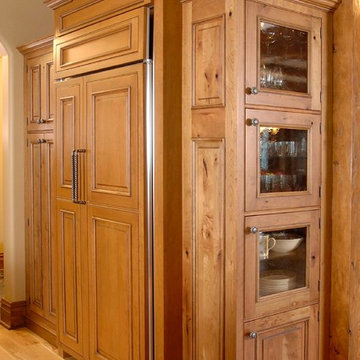 Rustic Cabinet Kitchen with Copper, Stone and Butchers Block Countertops