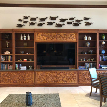 Polynesian Style Plumaria Carved Entertainment Center
