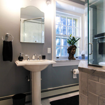 Pedestal Sink with Neighboring Fenestration
