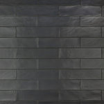 Merola Tile - Chester Matte Nero Ceramic Wall Tile - Offering a subway look, our Chester Matte Nero Ceramic Wall Tile features a smooth, satin finish, providing decorative appeal that adapts to a variety of stylistic contexts. With its non-vitreous features, this gray rectangle tile is an ideal selection for indoor commercial and residential installations, including kitchens, bathrooms, backsplashes, showers, hallways and fireplace facades. This tile is a perfect choice on its own or paired with other products in the Chester Collection. Tile is the better choice for your space!