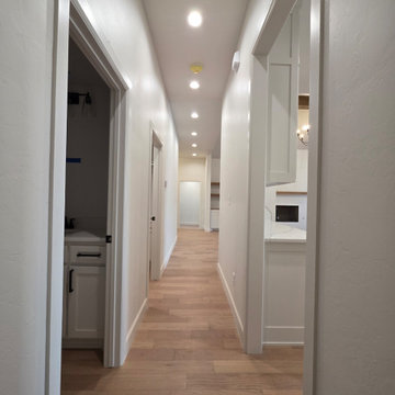 Hallway to bathroom, laundry, and 4th bedroom